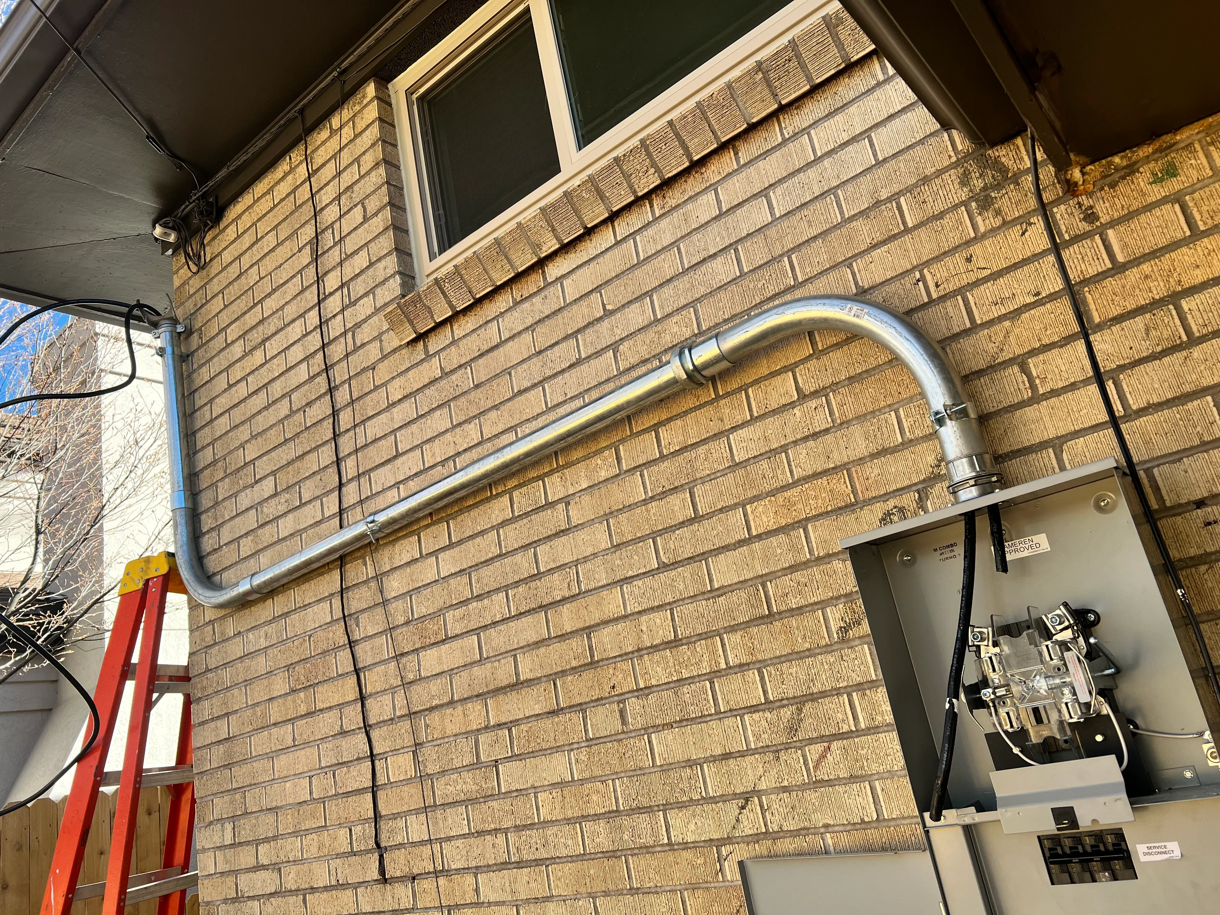 Electrician installing electrical outlet in residential home